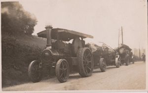 Burrell 4010 on the A46 at Woodchester during July 1935 seen with 2 heavily laden timber trailers , the entrance to the mill is behind the photographer